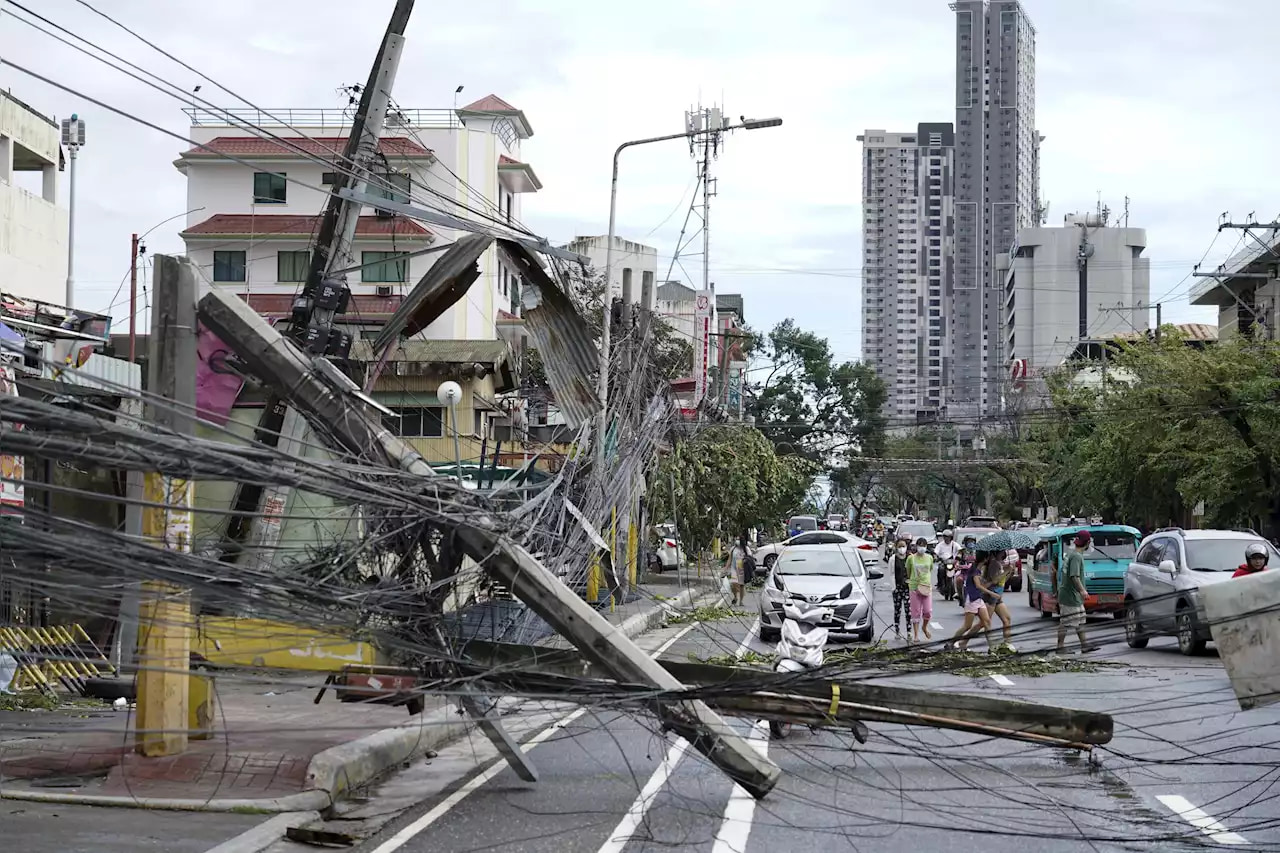 At least 3 dead as strong typhoon pummels Philippines