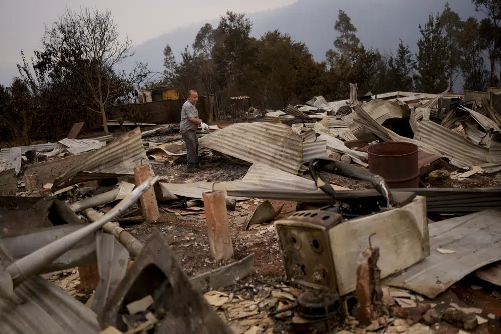 Raging wildfires claim at least 22 lives amid scorching heat wave