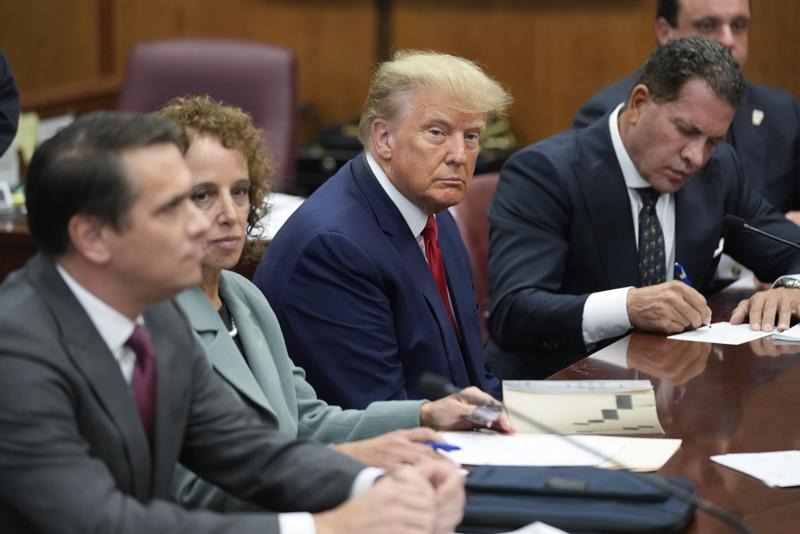 Donald Trump charged with 34 felony counts in hush money scheme