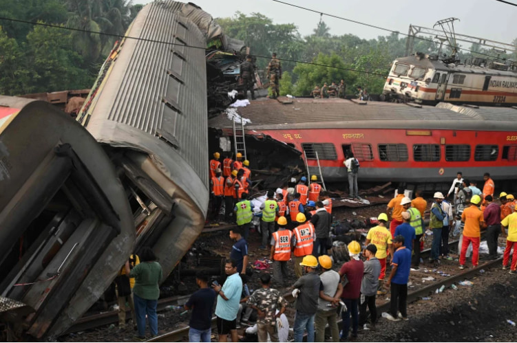 Indian officials end rescue work for 2 wrecked passenger trains that killed over 300 people