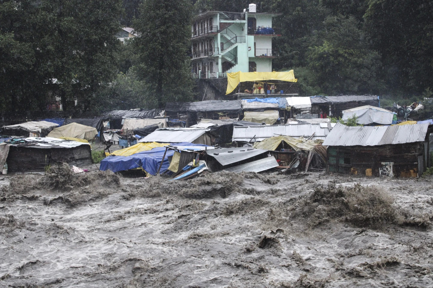 New Delhi schools close after monsoon floods kill at least 15, Pakistan on alert for more flooding