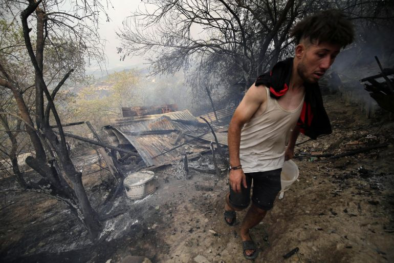 Wildfires in Algeria kills more than 30 including 10 soldiers battling the flames