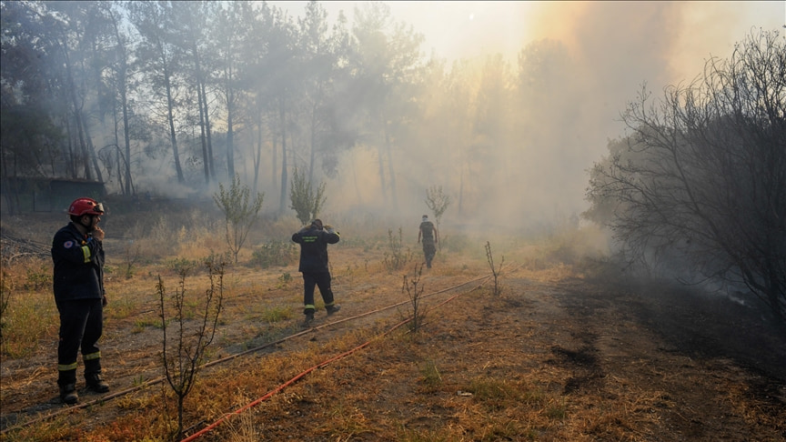 Thousands of tourists evacuated as huge wildfire rages across Greece's Rhodes island