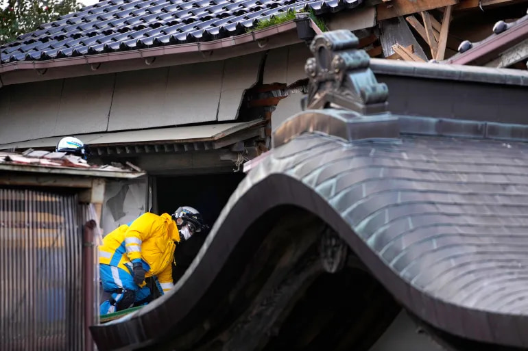 Woman in her 90s pulled alive from rubble of Japan earthquake