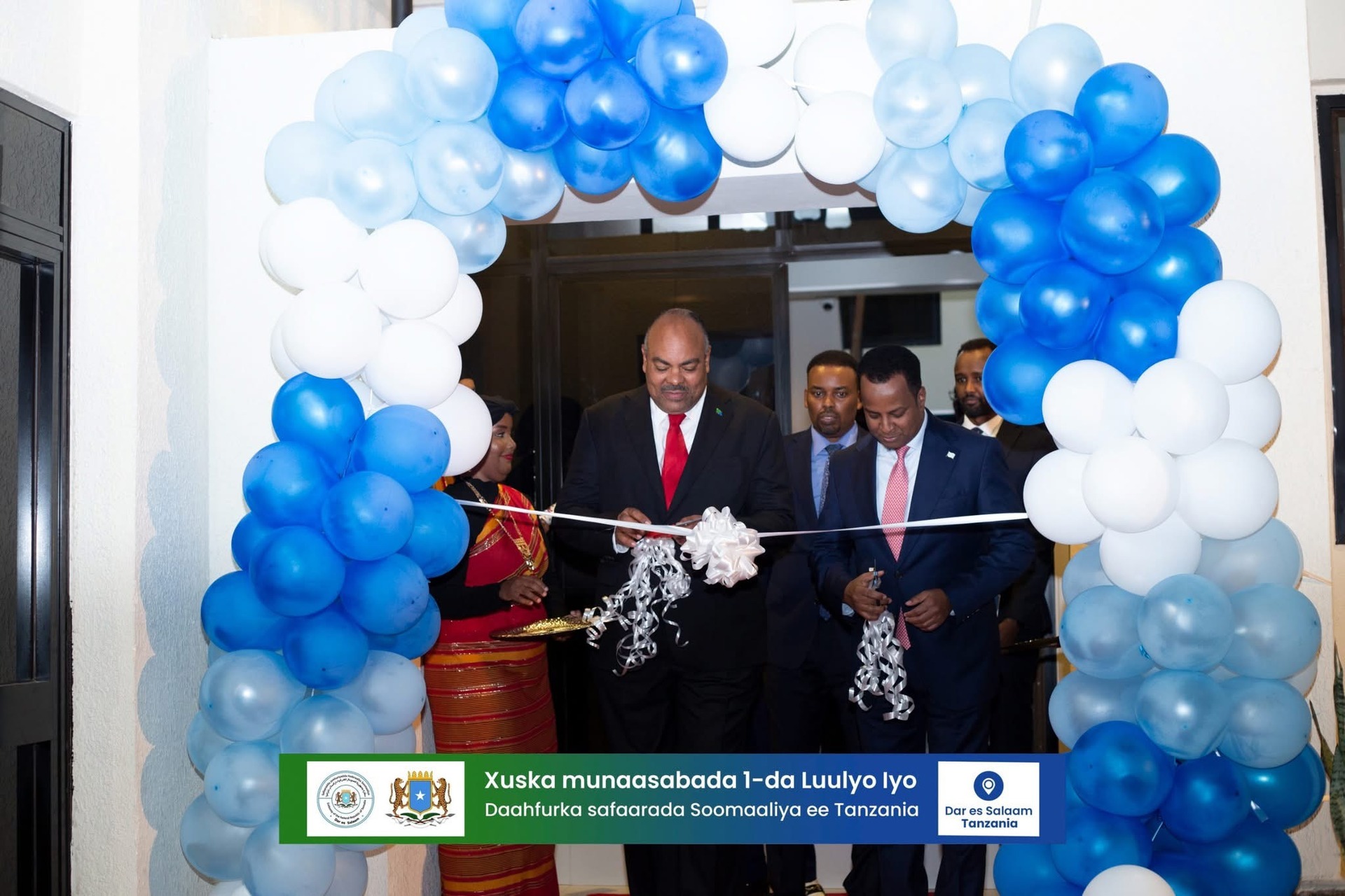 Minister of Foreign Affairs cuts the ribbon of the newly reconstructed embassy in Tanzania